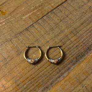 Gold and silver claddagh hoop earrings